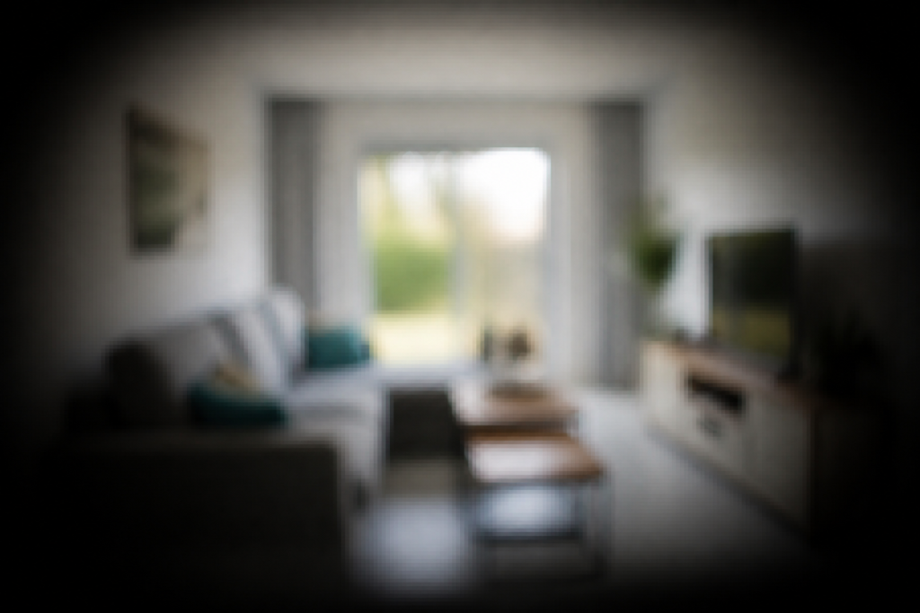 Vision floue progressive avec zones sombres peripheriques visibles